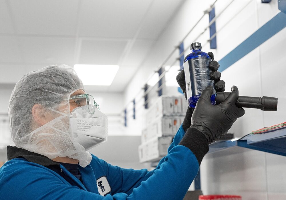 Inspecting terpene bottles in the True Terpenes lab